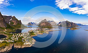 Reine fishing village surrounded by high mountains and fjords on Lofoten islands