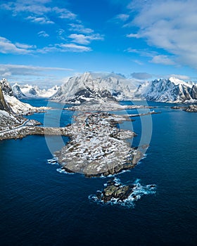 Reine Village and Mountains in Winter. Olstinden Peak. Moskenes, Lofoten Islands. Landscape of Norway. Aerial View