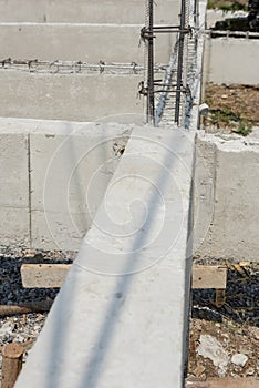 Reinforce iron cage for a house column in a construction site.