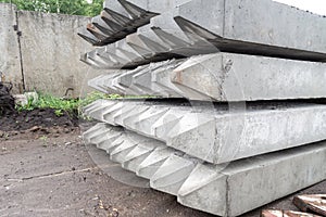 reinforced concrete piles for stockpiled in anticipation of a foundation on soft soils