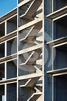 Reinforced concrete stairs in building construction site. House construction. Abstract geometric architecture background