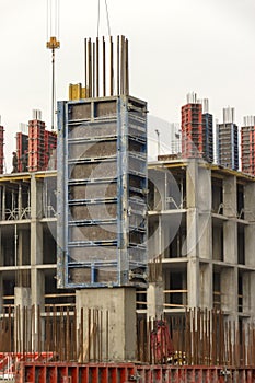 reinforced concrete wall of a multi-storey building in the process of construction.