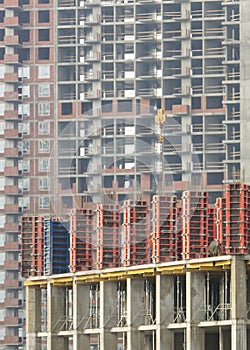 reinforced concrete wall of a multi-storey building in the process of construction.