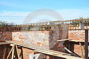 Reinforcement concrete bars with wire rod. Brickwork with Iron Bars for House Construction