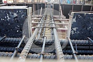 Reinforcement concrete bars with wire rod used in foundation of construction site. rebar steel bars.