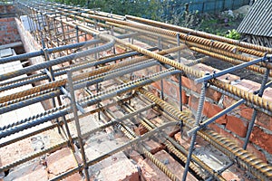 Reinforcement corner concrete bars with wire rod. Brickwork with iron bars for house construction