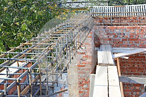 Reinforcement corner concrete bars with wire rod. Brickwork with iron bars lintels for house