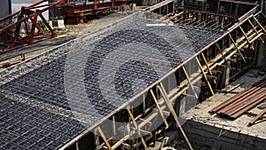 reinforcement metal framework for concrete pouring on ramp way structure in construction site