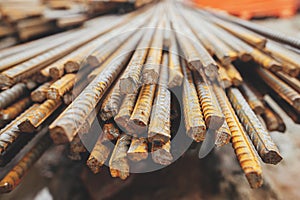 Reinforcement rods at construction site. Steel rebar close up. Rusty steel reinforcement bars for concrete. Process of house