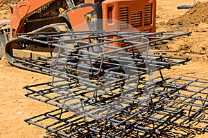 Reinforcement steel bars for reinforced concrete at a construction site using rebar wires