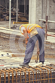 Reinforcing ironworker working on concrete formwork 5