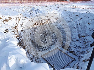 Reinforcing metal frame for pouring concrete foundation building