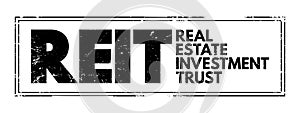REIT - Real Estate Investment Trust is a company that owns, and in most cases operates, income-producing real estate, acronym