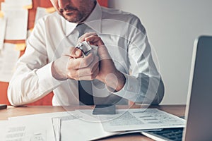 Rejected business idea, businessman crumpling paper