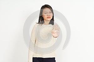 Rejection Gesture of Beautiful Asian Woman Isolated On White