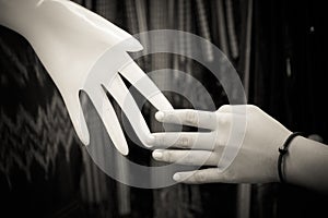 Relation concept : Human hand with plastic hand