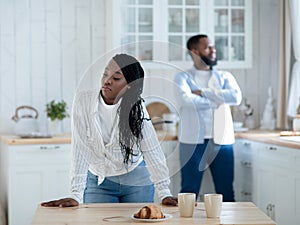 Relationship Crisis. Portraif Of Young Black Couple Standing In Kitchen After Argue
