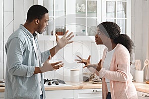 Relationship Problems. Young African American Couple Arguing In Kitchen