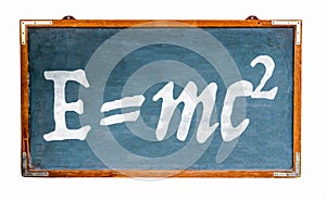 Relativity theory E=mc2 equation mass energy equivalence on blue old grungy vintage wide wooden chalkboard retro blackboard photo