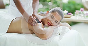 Relax, beauty and spa massage with a woman luxury spa treatment at resort or wellness center. Beautiful female enjoying