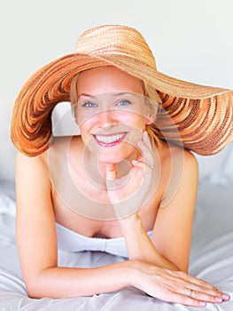 Relax, bikini and portrait of woman on sunbed at hotel for sunbathing, summer and tropical Bali vacation. Villa, resort