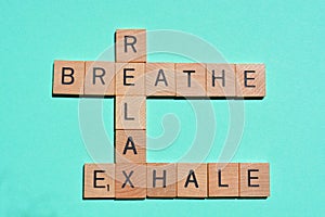 Relax, Breathe, Exhale, crossword on turquoise