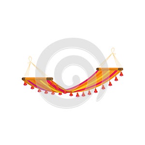Relax colorful red yellow textile hammock on beach