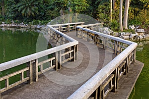 Relax footpath bridge on water photo