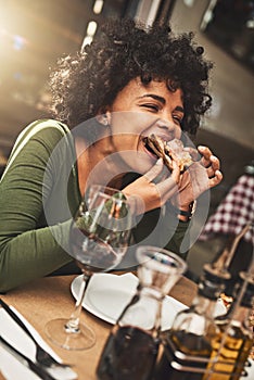 Relax, girl and woman with pizza, restaurant and red wine on a weekend break, delicious and celebration. Female person