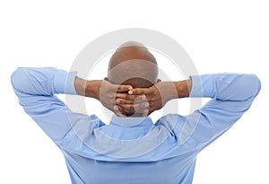 Relax, hands behind head and business black man in studio isolated on white background for complete work. Back, career