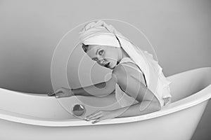 Relax and hygiene, spa and beauty, woman with towel turban in white bathtub