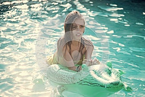 Relax in luxury swimming pool. Summer vacation and travel to ocean, maldives. Fashion crocodile leather and girl in