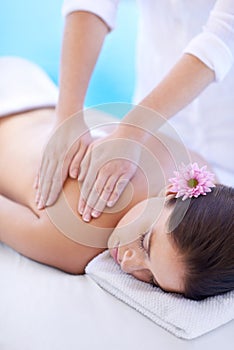 Relax, massage and woman at hotel pool with flower for health, wellness and luxury holistic treatment. Self care, peace