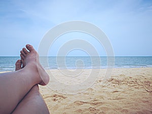 Relax moment at the beach. Personal perspective view on the beach