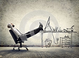 Relax in office - man sitting photo