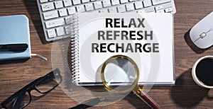 Relax, Refresh, Recharge on notepad
