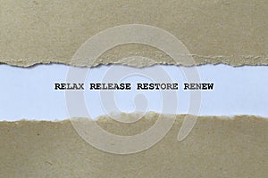 relax release restore renew on white paper