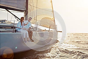 Relax, travel and luxury with couple on yacht for summer, love and sunset on Rome vacation trip. Adventure, journey and