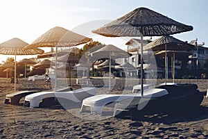 Relax under parasol on the beach of Aegean