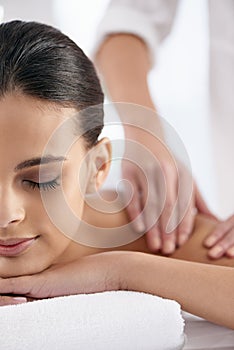 Relax, woman and hands massage shoulder for skincare, beauty and pampering body for wellness at luxury salon. Therapist