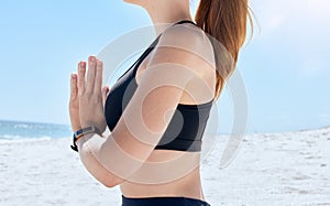 Relax, zen and meditation, woman on beach with focus and peace with blue sky and waves. Peaceful mindset, freedom and