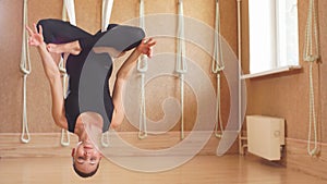 Relaxation on the antigravity yoga. young female is relaxing on the hammock