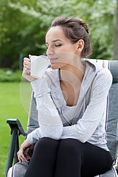 Relaxation with coffee in a garden