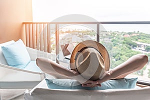 Relaxation healthy living lifestyle summer holiday vacation of freelancer woman take it easy resting in comfort chair in resort