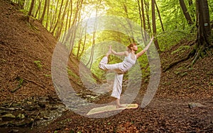 Relaxation joga pose in wonderful forest