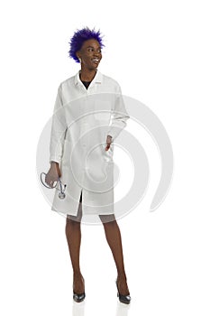 Relaxed African American Female Doctor Is Standing With Stethoscope. Full Length, Isolated