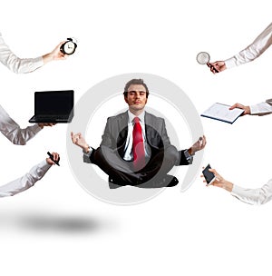 Relaxed businessman that does yoga during the work