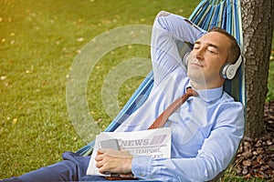 Relaxed businessman resting after work