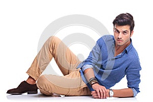 Relaxed casual fashion man lying down