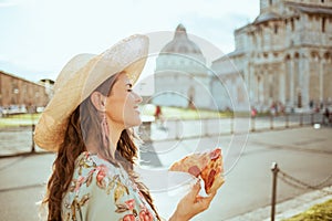 Relaxed elegant traveller woman in floral dress